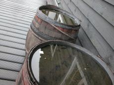 old wooden barrel barrels water reflection reflecting wine round metal ring