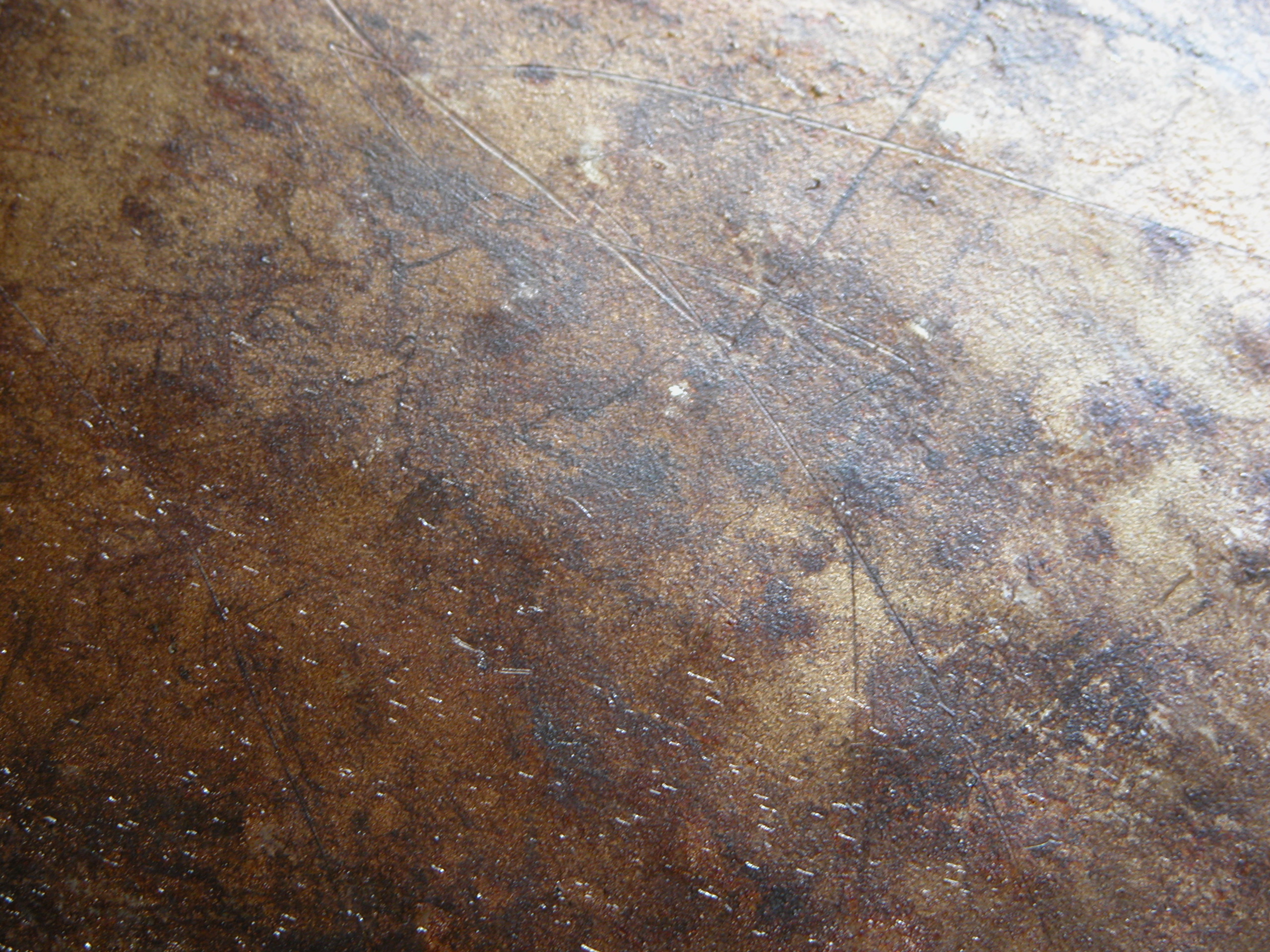 image-after-photos-metal-leather-brown-skin-hide-scratches-scratched