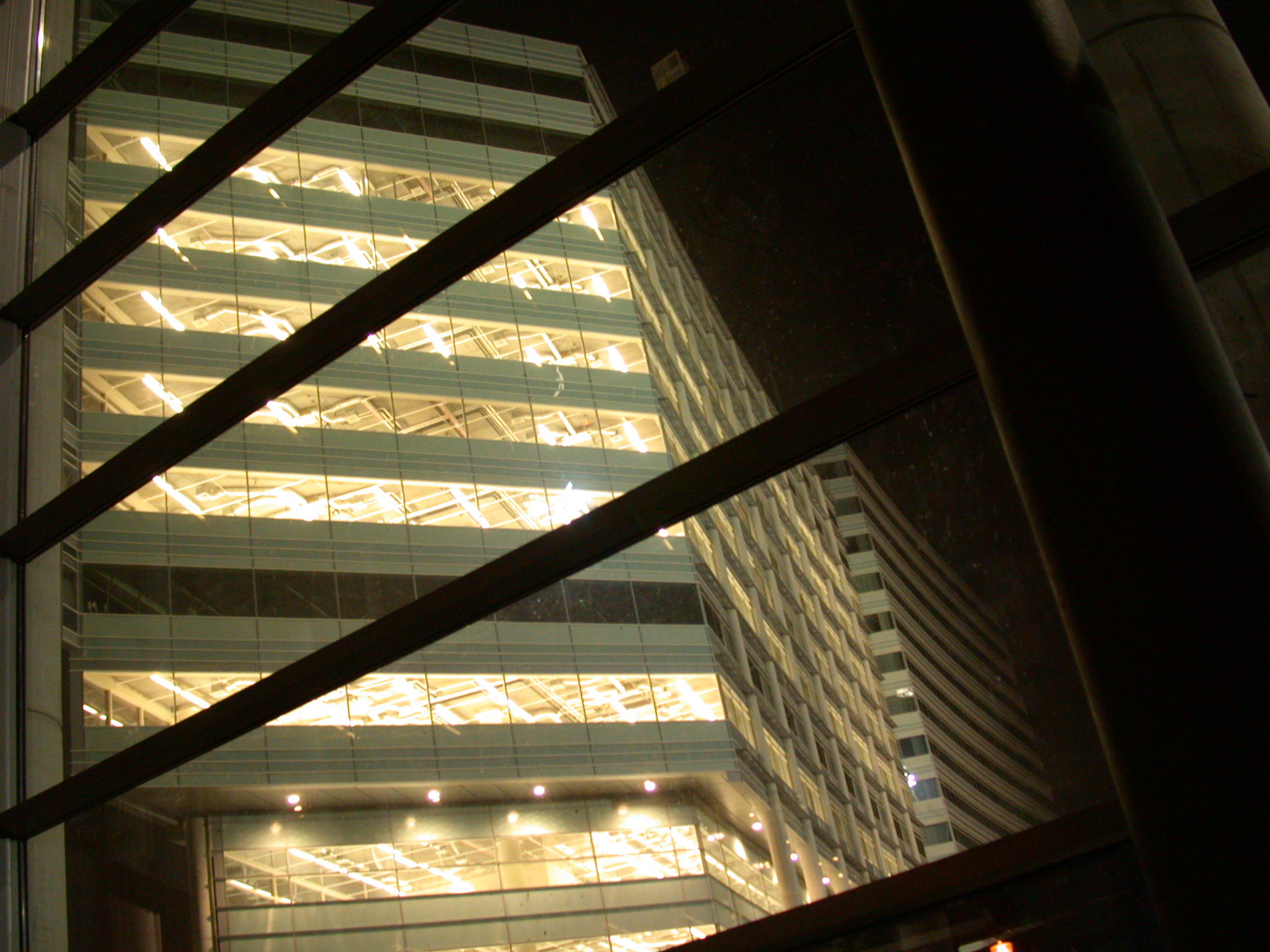 office window windows nighttime high building floors