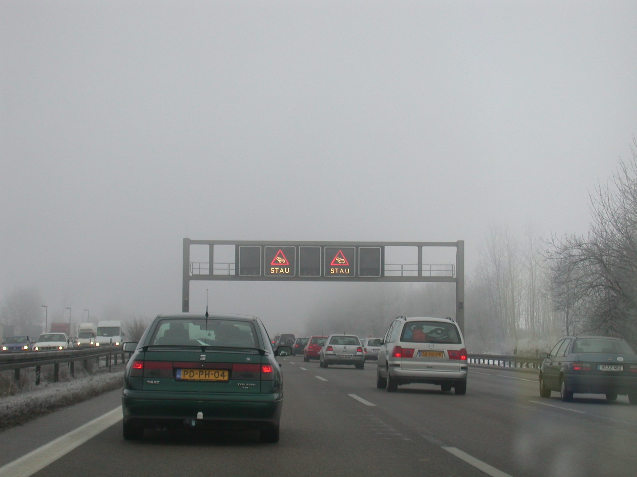 freeway fog cars road