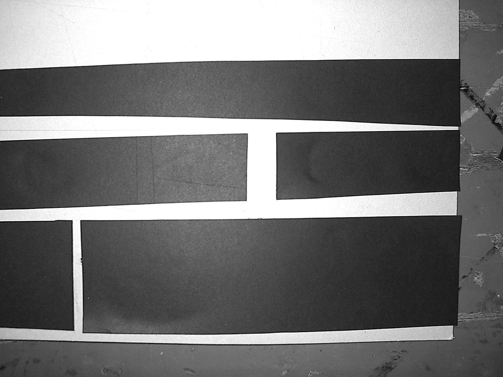 black white blocks cut outs paper wall