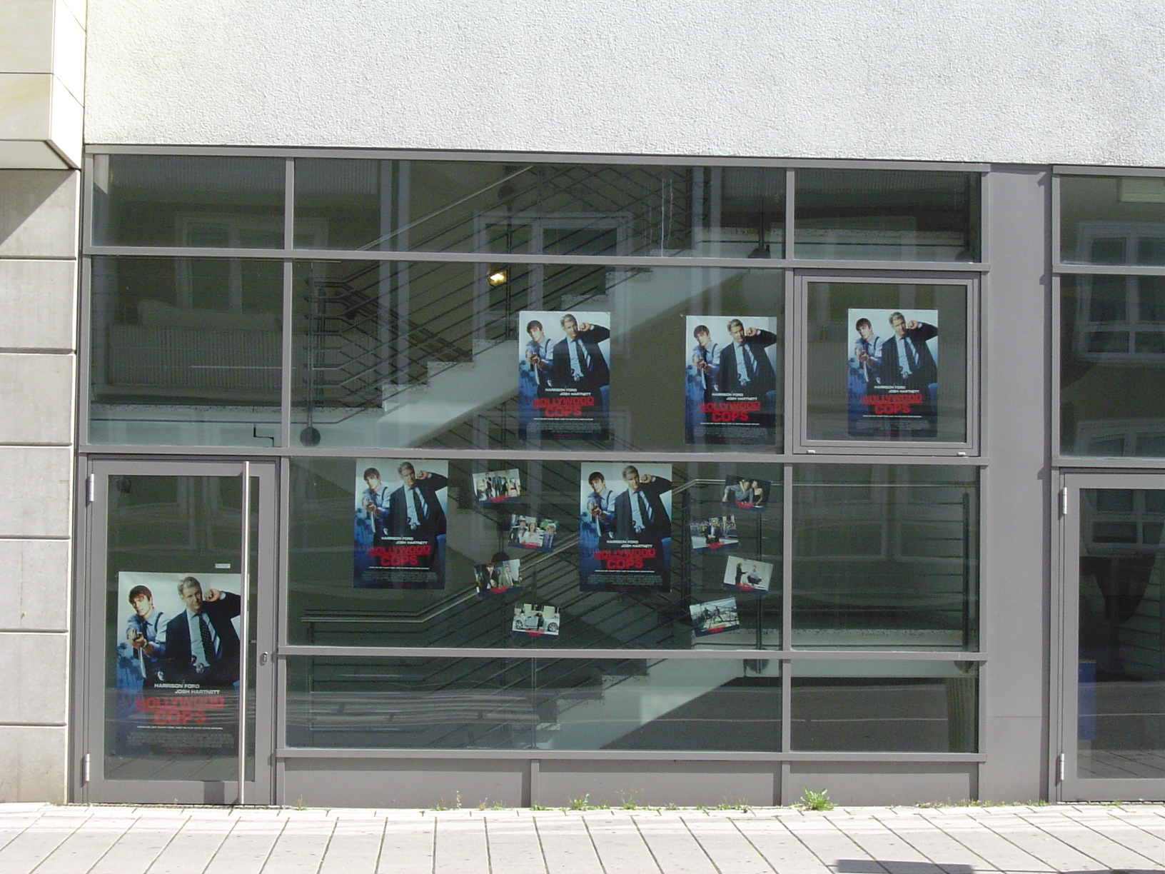 rigoletto storefront facade shop window posters