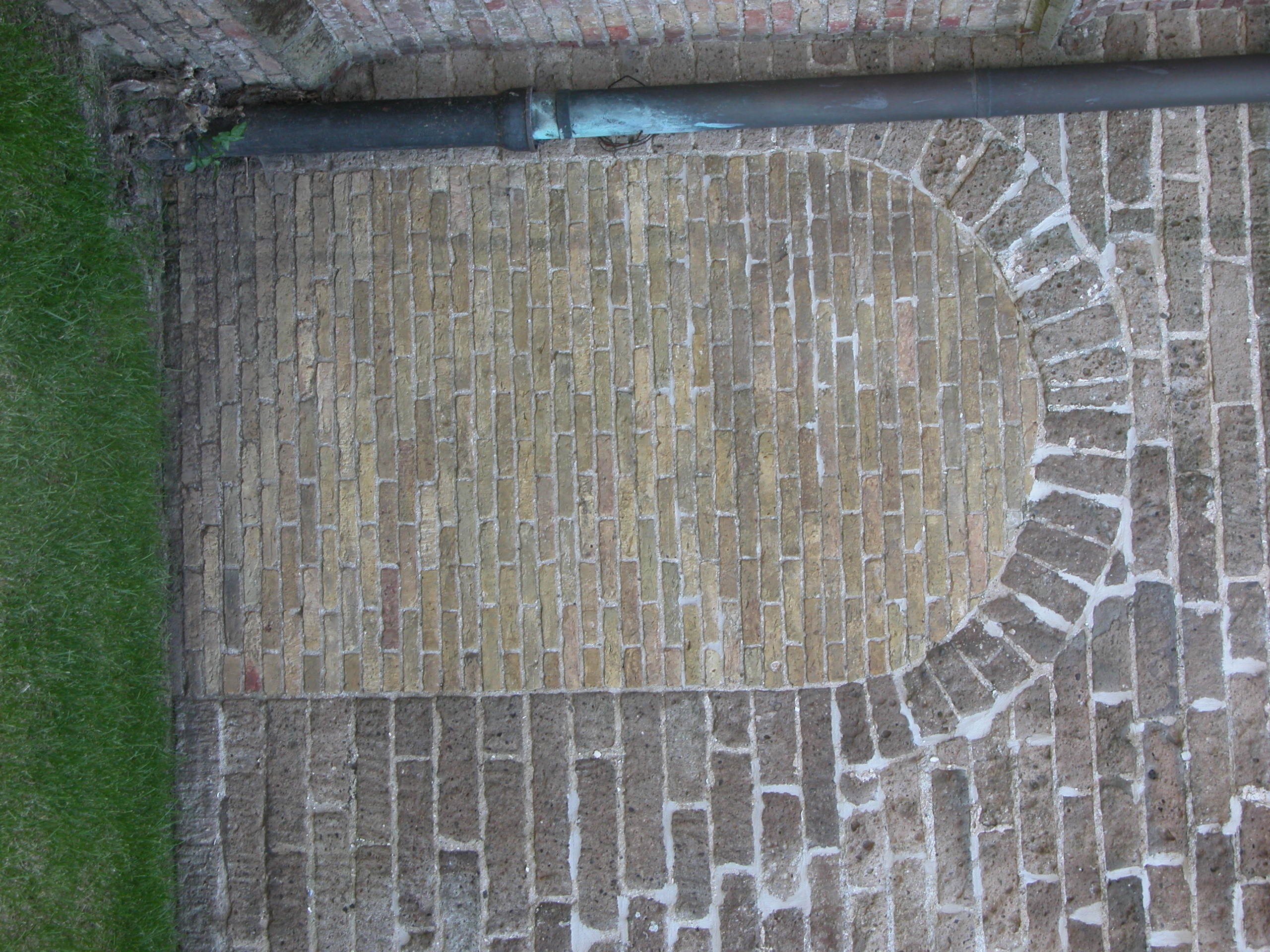 wall rounded doorframe walled up holed up bricks