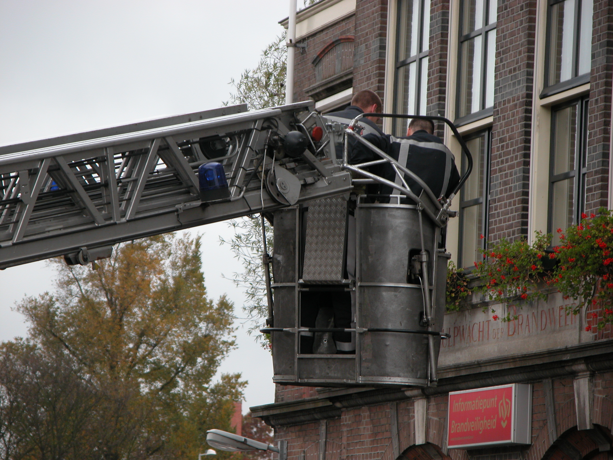 nature characters humanoids laddertruck man men fireman firebrigade ladder amsterdam metal