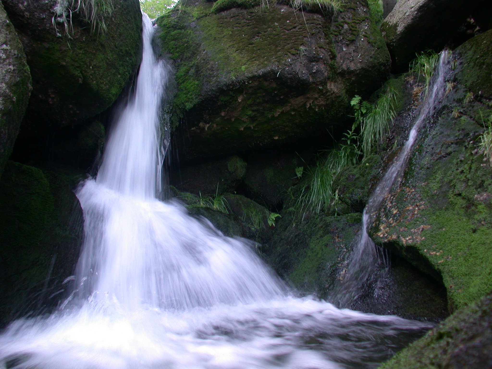 waterfall rocks water flowing stream white spray