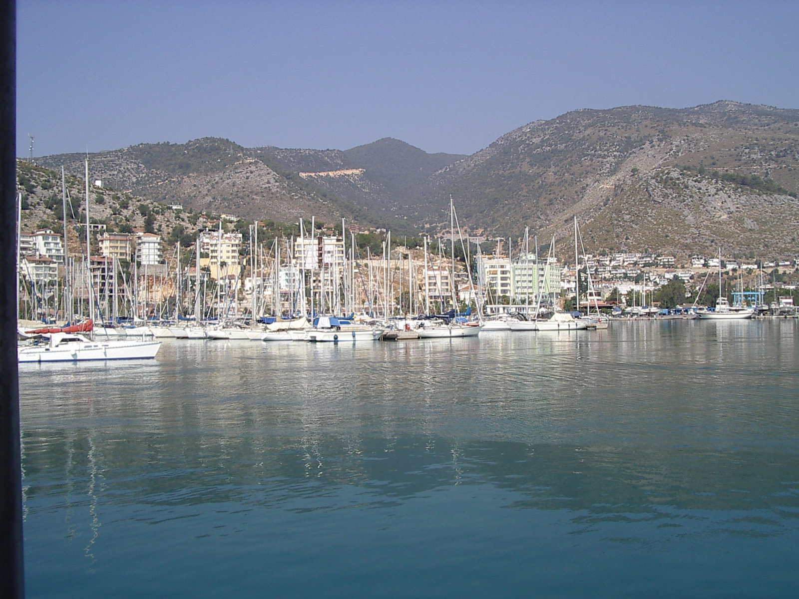 j_d island harbor harbour ships oats masts docked sea warm