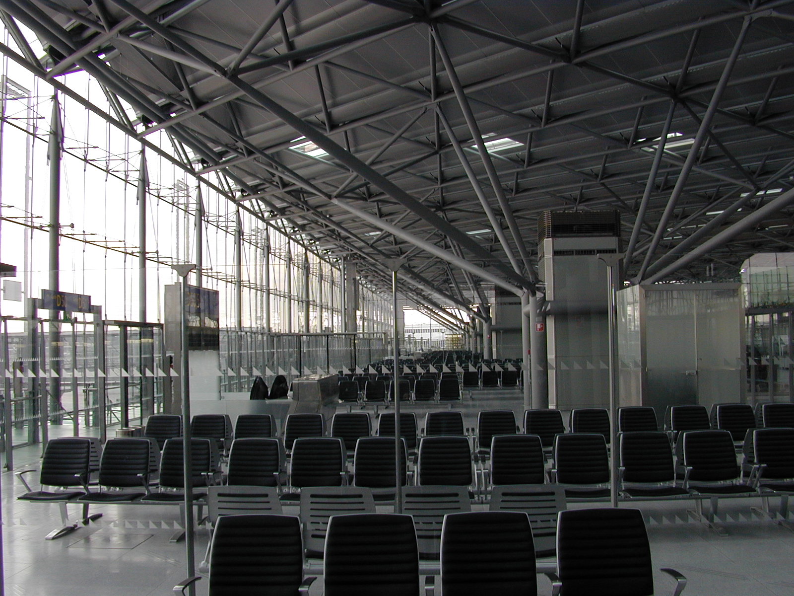 airport waiting room seets chairs glass