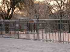 eva snow snowy winter playground children slide fence