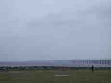 janneke field horizon water sea bridge road cars