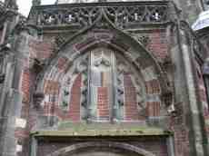 church building front arch bricks stone