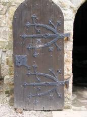 door wood iron bolts decoration stones masonry lock