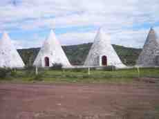 dario white pointy cones houses 