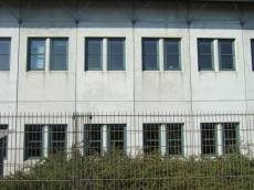 tabus wall barracks prison windows gray