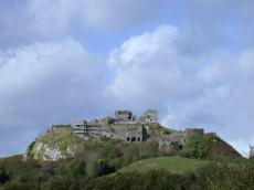 mountain fortress castle hill on top of a ruin ruins barrow downs walls stones