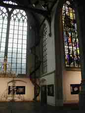 dario church spiral stairway stained glass windows high gothic chandelier