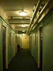hallway eva pipes corridor doors green walls