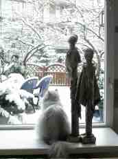 eva art sculptures winter cat staring out the window animals land human figures