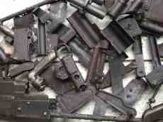 sculpture made of guns welded together African artist