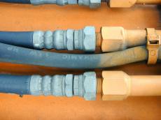 tube tubes orange pneumatic hydrolic crane metal rubber black mechanic coupling