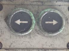 buttons arrows left right dirty metal chrome push