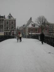 nature characters humanoids winter cityscape haarlem snow snowing bridge melkbrug biker