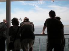 nature characters humanoids man woman passenger passengers leaning over railing silhouette silhouettes