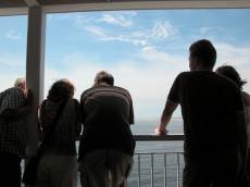 nature characters humanoids tourists on boat to texel backs silhouette silhouettes