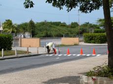 jacco curacao painting roadworks roadwork nature characters humanoids man negro road pylon
