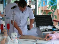 jacco curacao human nature characters humanoids man doctor uniform medic medics firstaid practice  infusion drip surgery stitch stiching suture