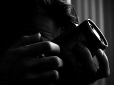 nature characters humanoids photographer human man lens hand b&w