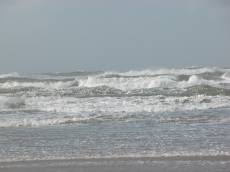 sea wave waves crashing cold windy day grey gray