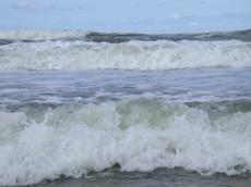 sea waves foam white caps beach
