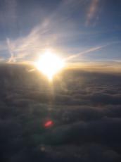 sun clouds aeroplane plane window