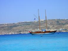 mediterran ship blue sea coast beach hills greece