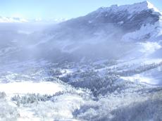 valley mountain mountains myst clouds cloudy nature landscapes snow winter trees firtrees white