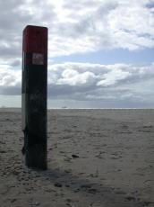pole on beach marker
