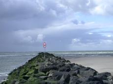 beach rocks water clouds ocean