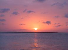 jacco tropical warm sunset sundown horizon sea seaside clouds