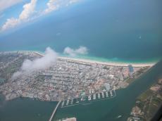 jacco island sea coastline coastal harbor harbour sky altitude skyscrapers buildings