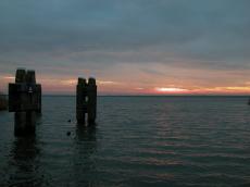 water pole sunset sunrise dusk dawn nature waterscapes sea poles clouds