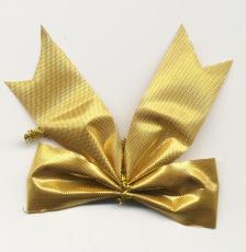 themabina bow present wrapping decoration gold golden