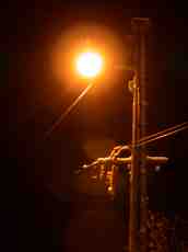 streetlight with snow orange light winter
