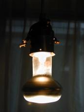 lightbulb bulb light dark burning pear glass metal