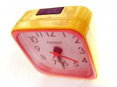 clock analog alarm alarmclock hand hands time telling device citizen numbers hours minutes hour minute yellow dial dials