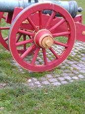 tabus canon red wheel spokes weapon round paint