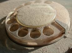 objects household telephone disc dial dust dusty need to clean phone plastic hole holes