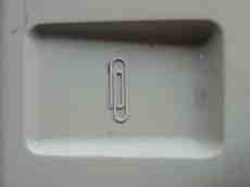 paperclip place hole basket on a copy machine plastic