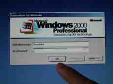 windows 2000 login screen finger touch screen logo microsoft