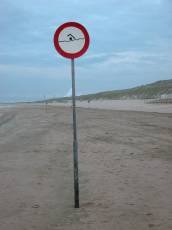 objects signs forbidden to swim swimming beach beachscape circle