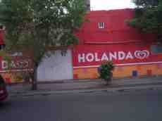 dario holanda sign ola wall painted red orange